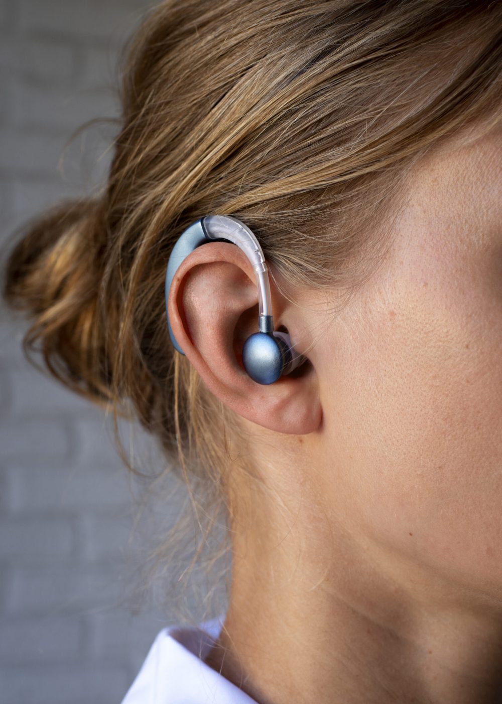 side-view-woman-wearing-hearing-aids